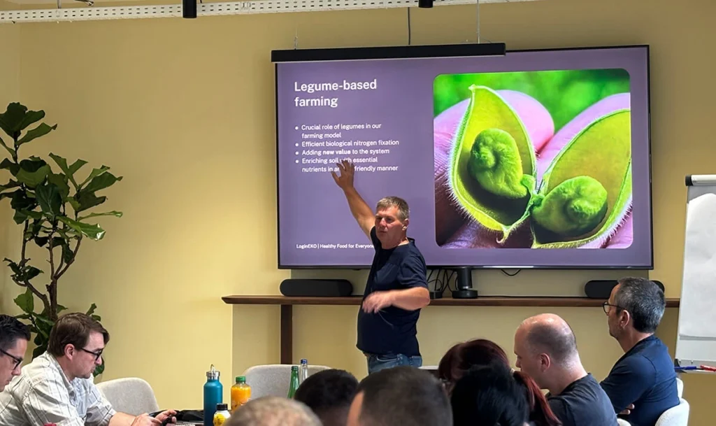 Đura Karagić presenting a slide on legume-based farming and biological nitrogen fixation during a session at LoginEKO